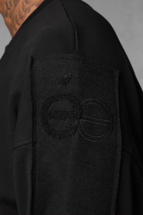 BLACK APPLIQUÉ DISTRESSED OVERSIZED SWEATER