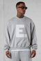 GREY E. STATEMENT APPLIQUÉ OVERSIZED SWEATER